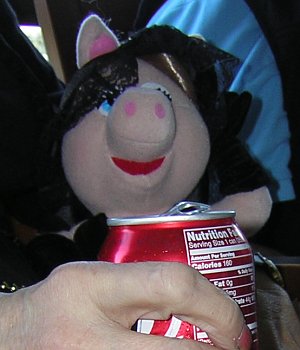 Miss Piggy Drinks